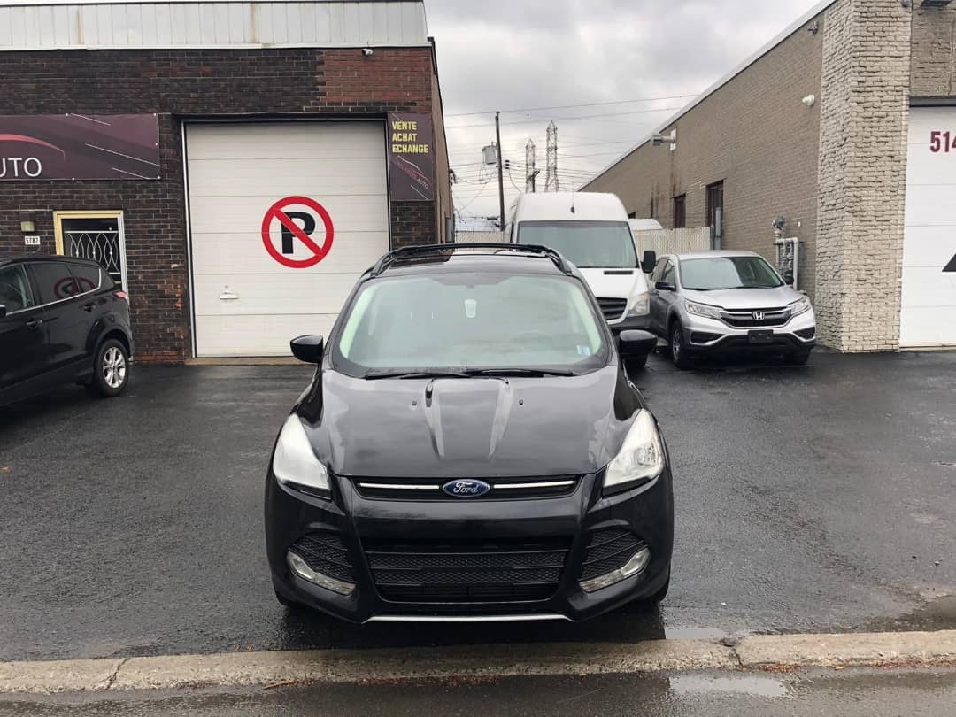 Ford Escape année 2013 automatique essance climatisé déjà dédouaner