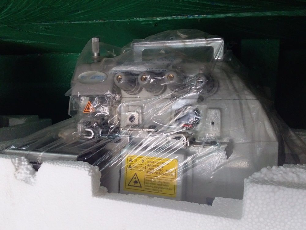 MACHINE SURFILEUSE 4 FILS