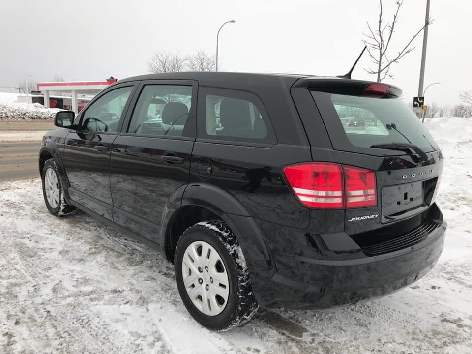 TRES BELLE VOITURE DODGE JOURNEY ,BIEN POUR VOUS ET LA FAMILLE,ANNEE 2014,ESSENCE,BOITE AUTOMATIQUE CLIMATISATION DORINE, PRX HORS TAXE. RENDEZ-VOUS A ELITE AUTO GRAND CARREFOUR DE FAFYA,NON DE LA FAMILLE SAINT GEORGES. APPELEZ VITE