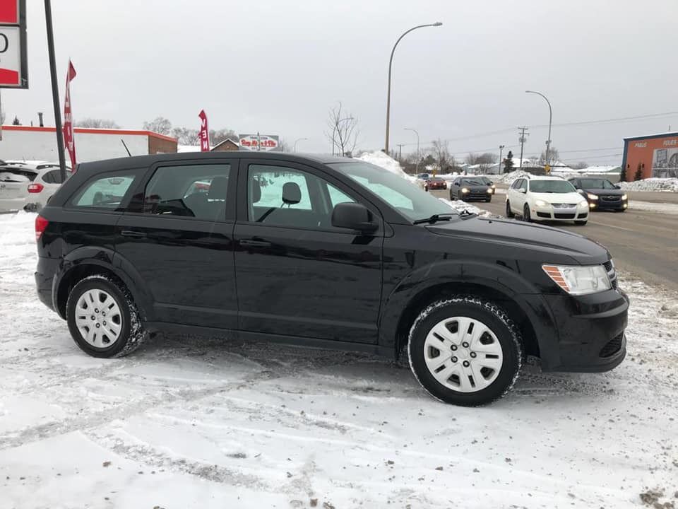TRES BELLE VOITURE DODGE JOURNEY ,BIEN POUR VOUS ET LA FAMILLE,ANNEE 2014,ESSENCE,BOITE AUTOMATIQUE CLIMATISATION DORINE, PRX HORS TAXE. RENDEZ-VOUS A ELITE AUTO GRAND CARREFOUR DE FAFYA,NON DE LA FAMILLE SAINT GEORGES. APPELEZ VITE