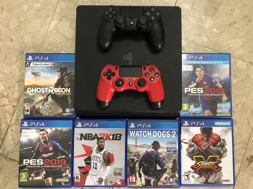 Console PS4 500 GIGA. 2 manettes et 6 CD de jeux récents.