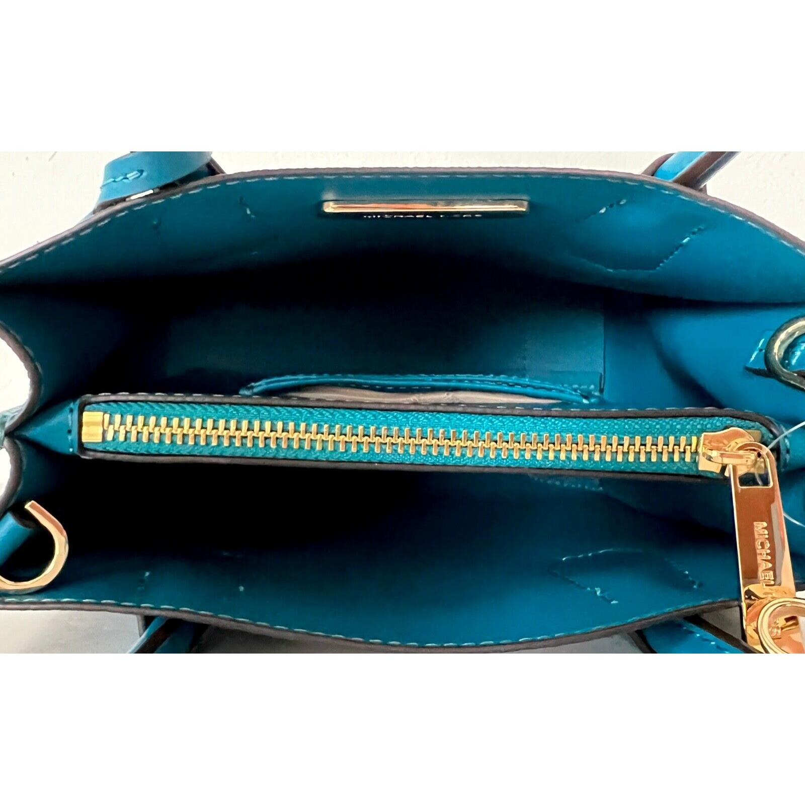 Michael Kors Mercer Sacoche à sac Signature MK brun moyen