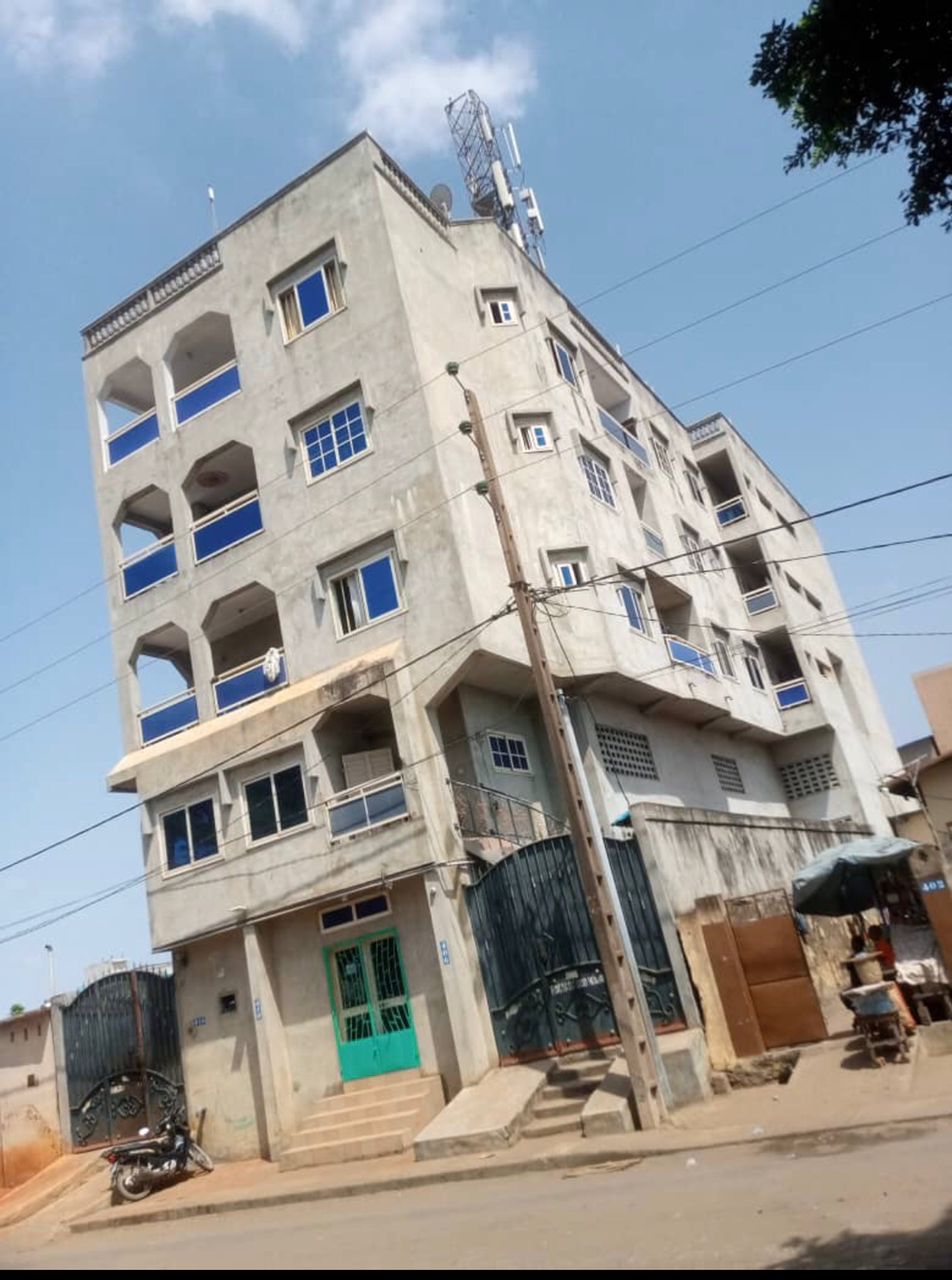 Immeuble locative sise à Cotonou Qtier Aidjedo au bord du pavé bien positionné