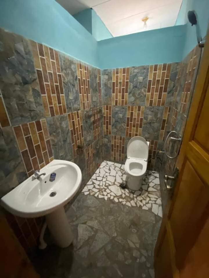 Appartement avec gardien forage parking à Odza petit marché